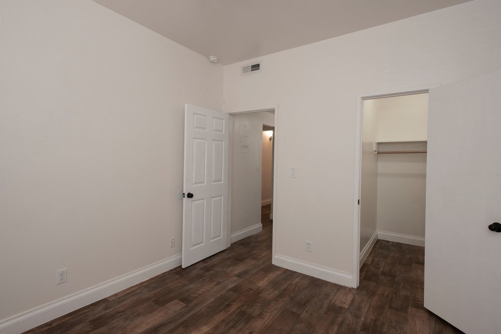 Bedroom with closet at Clarendon House in Sacramento, California