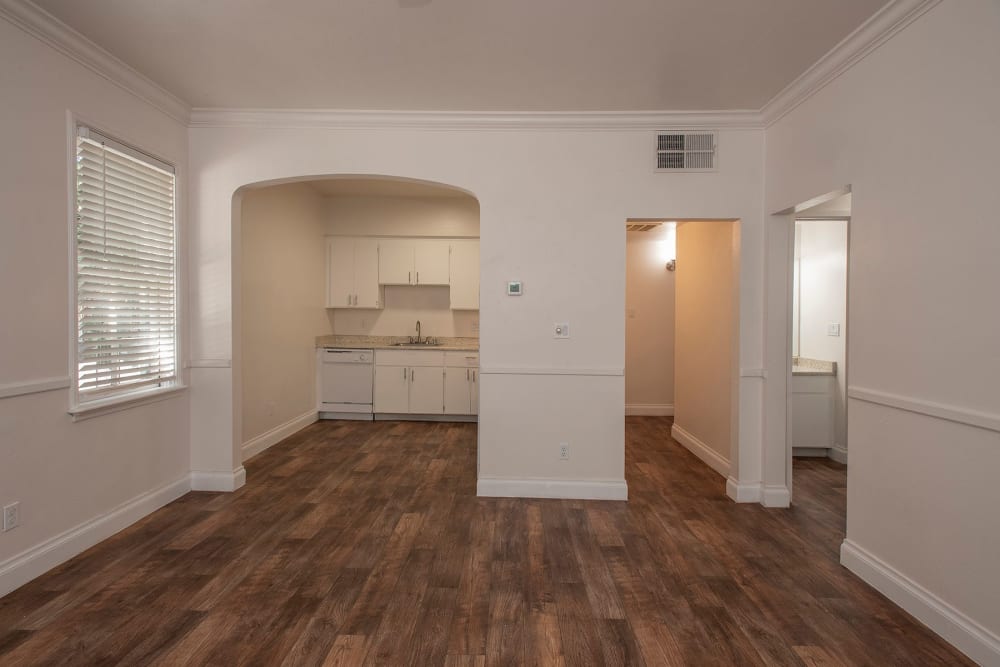 Living room and kitchen area at Clarendon House in Sacramento, California