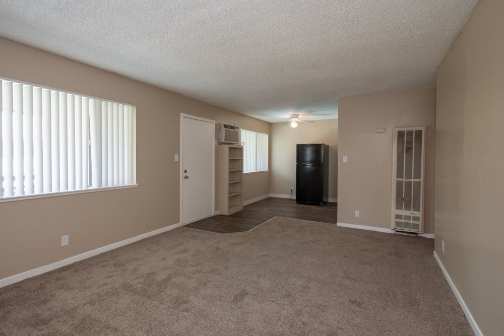 Spacious living room at Corabel Lane Apartments in Sacramento, California
