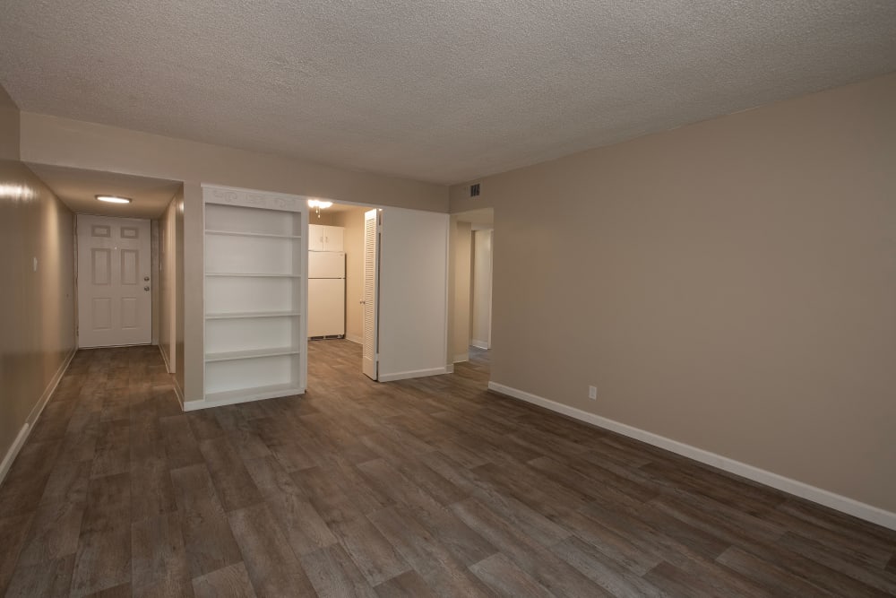 Spacious living room area at Country Club Gardens in Sacramento, California