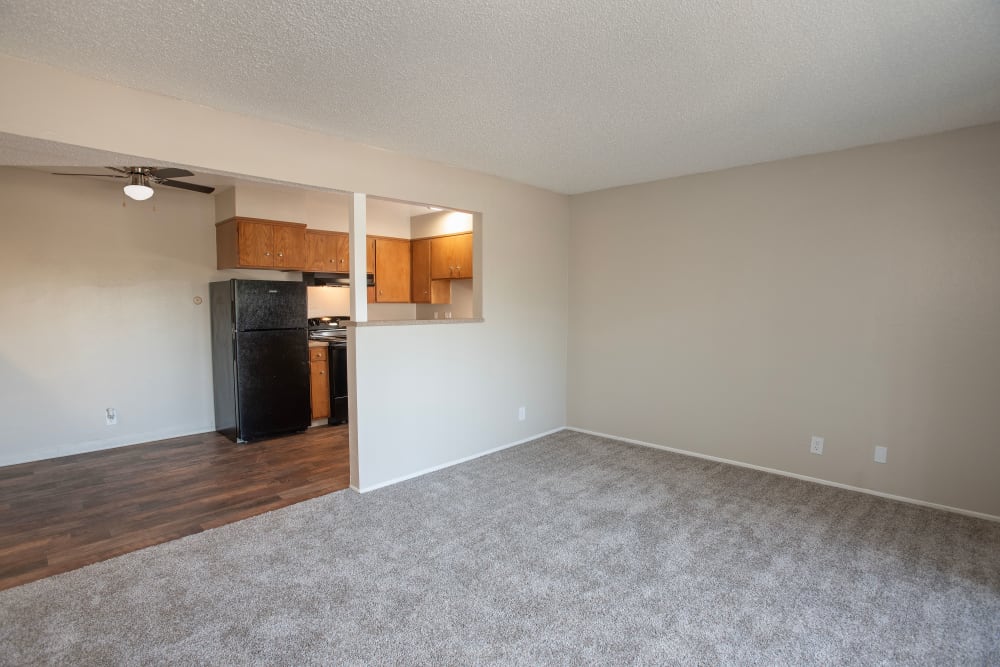 Spacious living and dining area at Arden Palms Apartments in Sacramento, California