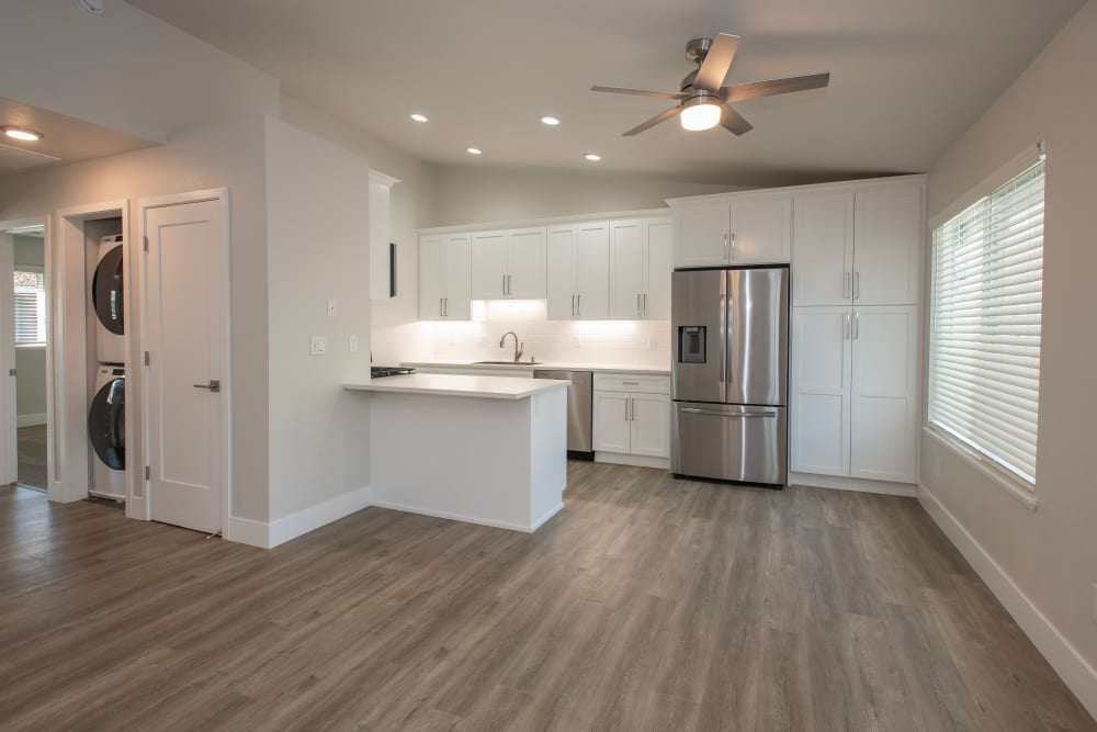 Living room and kitchen area at Meritage Apartments in Lodi, California