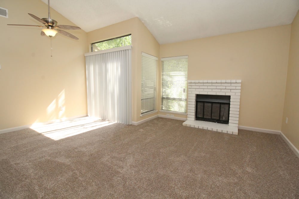 Patio doors and fireplace at Huntcliffe Apartments in Fair Oaks, California