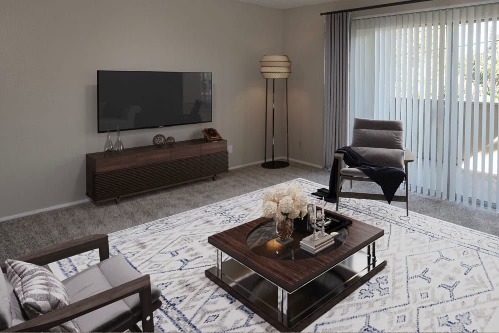 Spacious living room area of Arden Palms Apartments in Sacramento, California