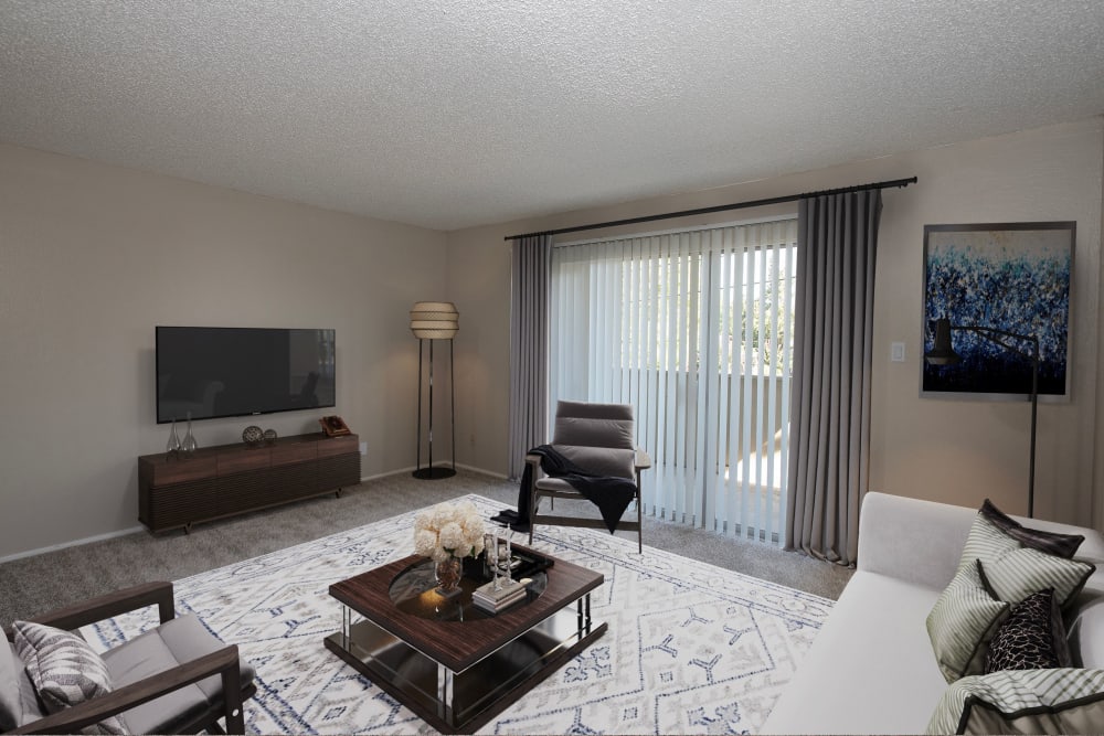 Spacious living room at Arden Palms Apartments in Sacramento, California