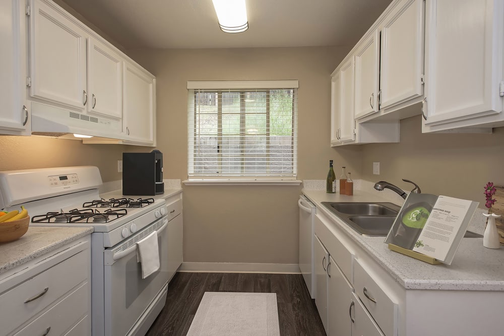 Well-lit kitchen at Auburn Townhomes in Auburn, California