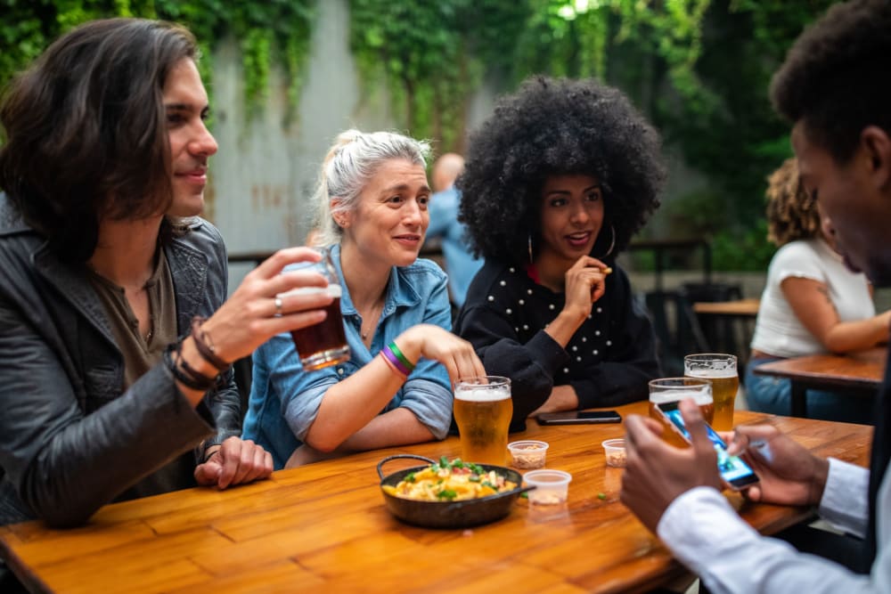 Friends having a beer near Country Club Gardens in Sacramento, California