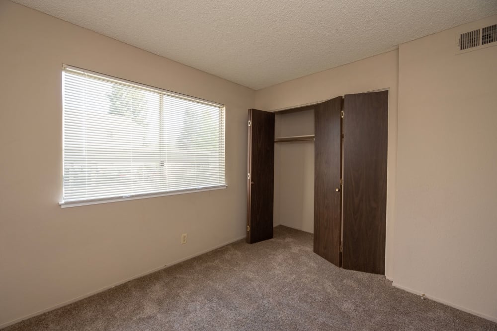 Bedroom with closet at San Juan Hills in Fair Oaks, California
