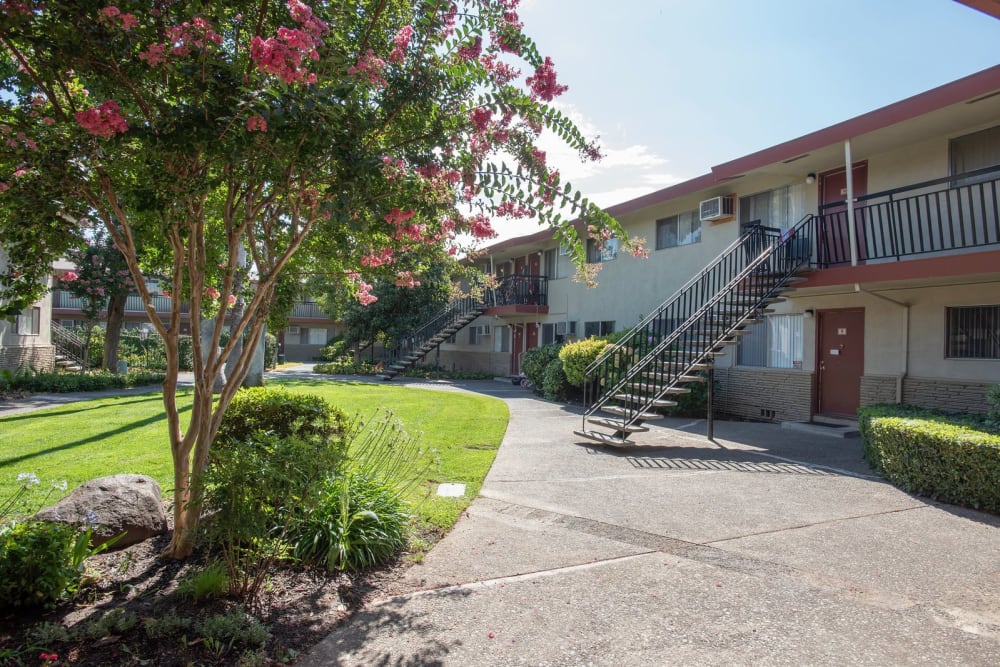 Walkways and landscaping at Corabel Lane Apartments in Sacramento, California