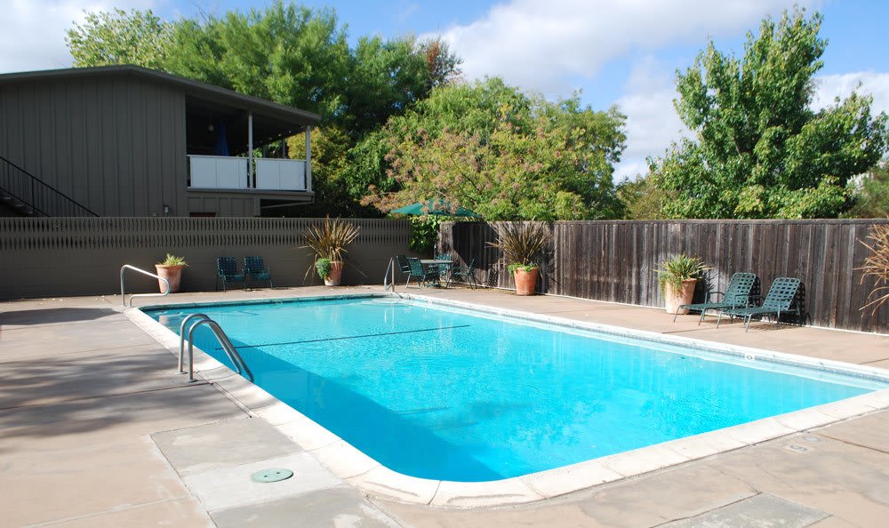 Sparkling outdoor pool at Castle Hill Apartments in Sacramento, California