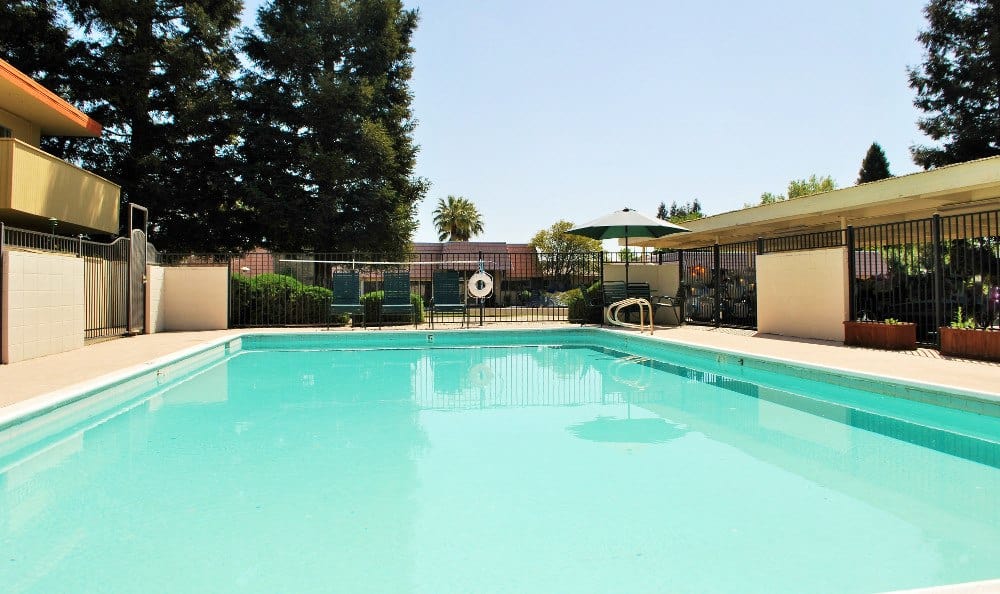Outdoor pool at Arden Palms Apartments, in Sacramento, CA