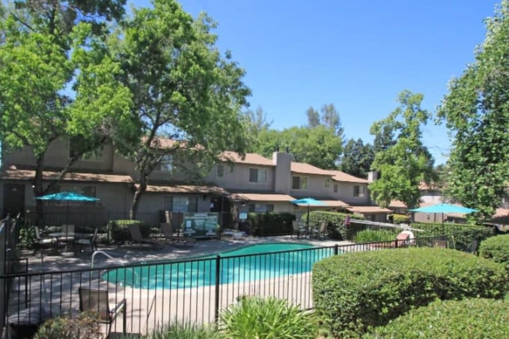Swimming pool area at Auburn Townhomes in Auburn, California