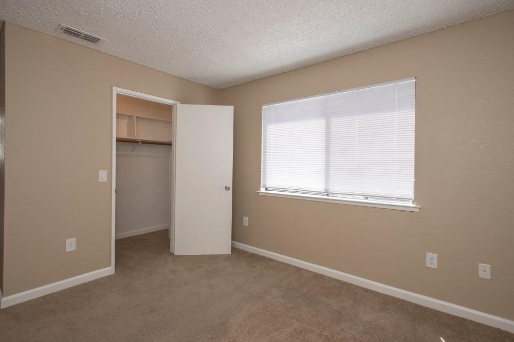 Well-lit bedrooms at Huntcliffe Apartments in Fair Oaks, California